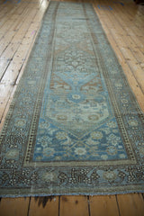 Distressed vintage Malayer runner shows powder blue, dusty teal Herati field and floral border.