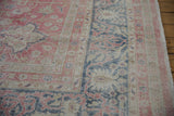 Distressed texture and faded raspberry, dark denim blue vinery on vintage Sparta carpet.