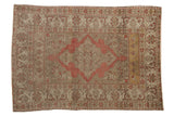 Distressed vintage Kayseri rug with a scalloped blush medallion, floral motifs, and a sandalwood field.