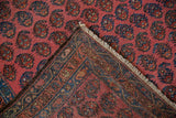 Vintage Kurdish Hamadan rug with hand-knotted reverse weave and blush boteh field.