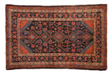 Vintage Malayer rug, navy field, brick red medallions, with intricate Herati designs.