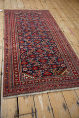 Intricate geometric guls and blossoms in the border of a vintage Turkmen runner.