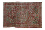 Distressed vintage Persian Josan Sarouk rug with red and slate blue-green medallion and vinery.
