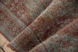 Distressed Josan Sarouk rug's time-softened dusty red and slate blue-green vinery.