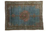 Distressed vintage Malayer rug with oversized medallion, birds, and an abrashed dusty blue field, 4'4