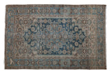 Vintage Distressed Hamadan rug with a stepped medallion in dusty sapphire blue, beige, and brown tones.