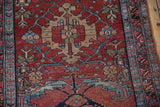 Mehreban rug, intricate serrated leaf border, scrolled blossoms; cherry red and powder blue palette.
