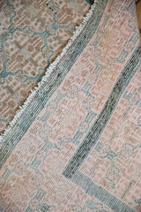 Textured distressed Malayer rug pile revealing its tightly woven foundation.