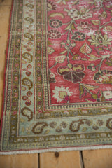 Vintage Distressed Doroksh rug corner with pale slate blue paisley and pawn motif borders. Worn magenta field.