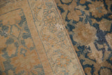 Malayer rug's distressed pile and reverse side, revealing sky blue patterns and visible foundation.