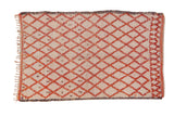 Vintage Moroccan rug, ivory with tangerine, red diamond lattice and germinating seed motifs.