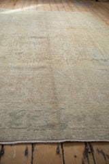 The low-pile texture and mostly even wear on a vintage distressed Mehrivan carpet.