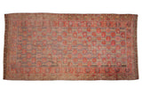 Antique distressed Uzbeki Khotan rug runner, dusty purple field with red-gold floral motifs, 6'8