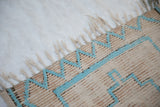 Textured vintage Moroccan runner pile with turquoise chevron pattern and cotton white fringe.