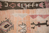 Plush pile, geometric border, and original selvage on a vintage Moroccan hand-knotted rug.