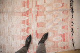Vintage distressed Moroccan runner's shaggy pile, with abstract blush and ivory patterns.