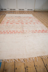 Ivory flatweave section of the vintage Moroccan rug runner, featuring a dashed blue line.
