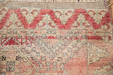 Thick pink and ivory pile vintage Moroccan rug with dragon inspired trefoil border, natural fringe.
