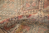 Thick, shaggy pile of a vintage Moroccan rug, with trellis design and abrashes.