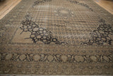 Distressed Sivas carpet corner with pale coffee brown and charcoal arabesque floral spandrels and cartouches.