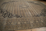 Distressed Sivas carpet border, charcoal curvilinear patterns with worn pale coffee tones.