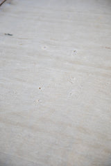 Close-up of the vintage Turkish hemp Kilim rug texture with platinum and sand abrash.