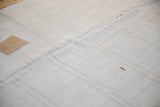 Pale sand tones of the vintage Turkish hemp kilim, featuring a central seam and tan patch.