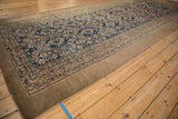 Distressed antique Persian runner with geometric Herati design in cobalt blue, blush, and ivory.