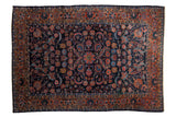 Vintage Dargezine carpet with allover navy floral arabesque design in brick red and copper.