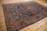Intact side cord selvage and brick red floral border on the vintage Dargezine rug.
