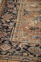 Vintage Mehrivan carpet's textured hand-knotted pile showing geometric floral, boteh, and Herati patterns.