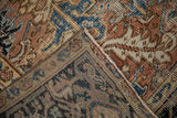Mehrivan carpet hand-knotted reverse and pile detail, side cord selvage, geometric floral in blush, navy.