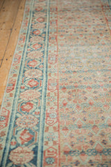 Antique Distressed Malayer runner, main border with blue pomegranate vines, and faded floral field.