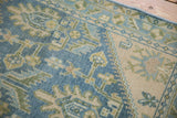 Distressed vintage Hamadan runner detail: worn blue field and pearl-patterned ivory minor border.