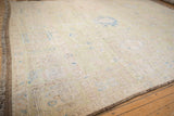 Original brown side cord selvage and sheared pile of the distressed Afghani Oushak rug.