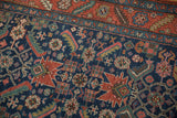 Heriz runner: detailed cobalt blue Herati design with madder red serrated leaf border.
