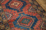 Vintage Northwest Persian runner's geometric guls and animal motifs in sapphire blue, madder red.