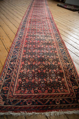 Vintage Hamadan runner: brick red Herati field detail with dusty teal serrated leaf border.