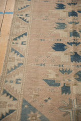 Even wear across the low pile of a hand-knotted vintage Oushak rug.