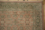 Distressed vintage Hamadan runner showing faded dusty rose, green Herati design.