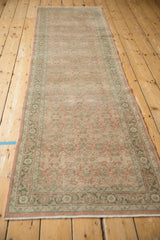 Hamadan runner's distressed texture, dusty rose Herati field, and inverted Samovar turtle border.