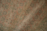 Distressed vintage Hamadan rug, revealing knot heads and dusty rose, pale green Herati pattern.