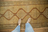 Saffron yellow distressed Serab runner with chestnut serrated hexagonal geometric medallions.