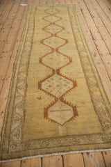 Distressed Serab runner showing hexagonal medallions with serrated borders and floral geometry.