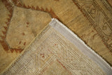 Distressed Serab rug pile and hand-knotted foundation in saffron and chestnut tones.