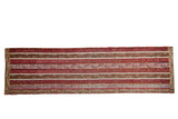 Vintage Anatolian rug runner with repeating parallel lines in cherry red, olive green, and saffron yellow.