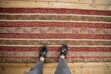 A personal view of the repeating vine and water channel motifs on an Anatolian runner.