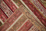 Folded corner showing the dense hand-knotted foundation and green selvage of a vintage Turkish rug.