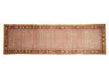 Vintage Oushak runner, pale peach floral field and cherry red, saffron geometric borders.