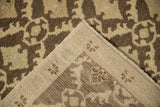 Distressed Oushak runner with worn brown floral pile and reverse showing painted number.